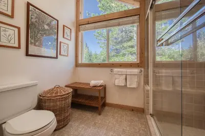 a bathroom with a shower and a toilet at Sparrow's Rest by Tahoe Getaways - Pet-Friendly 3BR in Tahoe Donner w HOA in Truckee