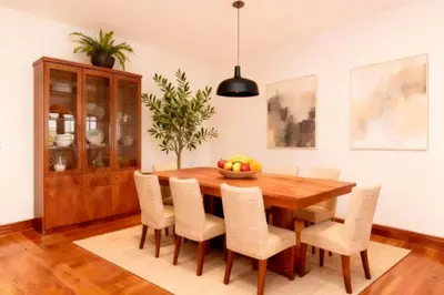 a dining room with a wooden table and chairs at Mammoth Lakes Alpine Stay in Mammoth Lakes
