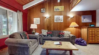 a living room with a couch and a table at Horizons 4 120 Great Complex Amenities, On The Shuttle Route, Walk To Shops and Restaurants condo in Mammoth Lakes