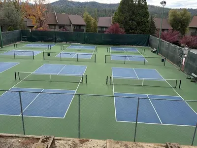 a group of tennis courts on a tennis court at 