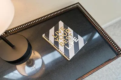 a glass table with a lamp and a sign on it at TKC0693- Keys Dream townhouse in South Lake Tahoe
