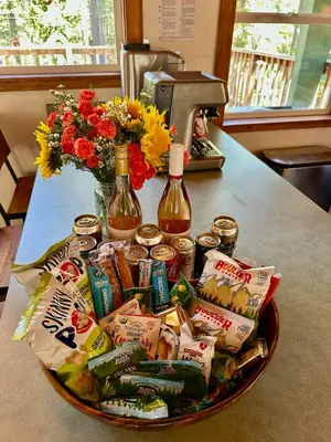 a basket of food and drinks on a counter with a mixer at Tahoe Park HOA l Palisades l Hot Tub l Dogs OK in Tahoe City