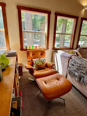 a living room with a leather chair and a couch at Palisades, Lake Tahoe, Tahoe City, Hot Tub, Dogs OK in Tahoe City