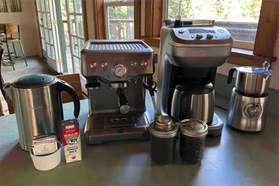 a coffee maker sitting on a counter next to a mixer at Palisades, Lake Tahoe, Tahoe City, Hot Tub, Dogs OK in Tahoe City