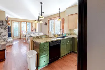 a kitchen with a sink and a counter at Mammoth Green 116 in Mammoth Lakes