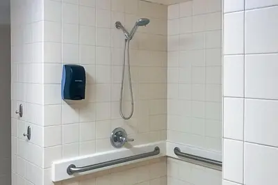 a shower in a bathroom with a shower head at Mammoth Green 110 in Mammoth Lakes