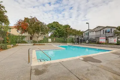 a swimming pool in the middle of a sidewalk at Extended-Stay Ready! Elk Grove Unit with Pool Access in Elk Grove