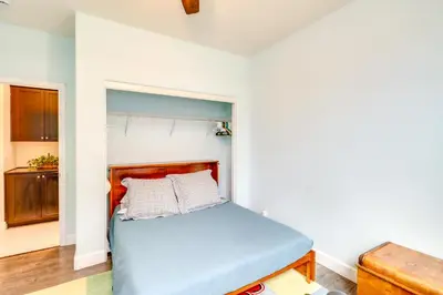 a bedroom with a blue bed in a room at Family-Friendly Retreat with Playground in Reno! in Reno