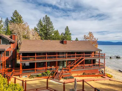 a house on the shore of a lake at Tahoe Edgelake Beach Club by Coolvacay in Tahoe Vista