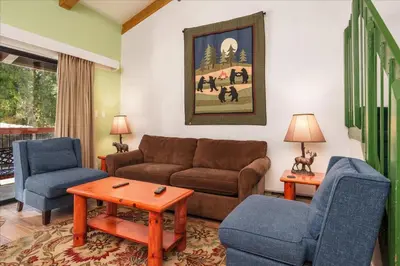 a living room with a couch and two chairs at (A204) Loft Condominiums in Yosemite West