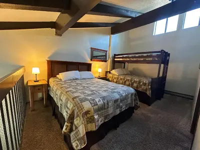 a bedroom with two beds in a room at (A203) Loft Condominiums in Yosemite West