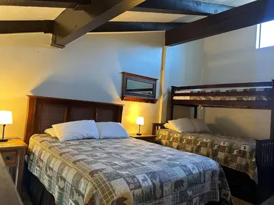 a hotel room with two beds and a window at (A203) Loft Condominiums in Yosemite West