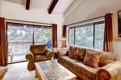 a living room with a couch and two chairs at (B207) Loft Condominiums in Yosemite West