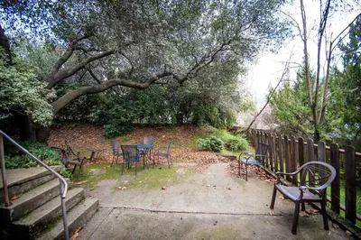 a group of chairs and tables in a yard at Family Getaway Near Yosemite - Downtown Mariposa in Mariposa