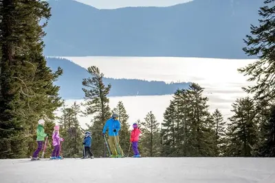 a group of people on skis in the snow at Martis Landing home in Truckee