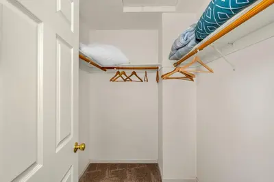 a room with a bed on the wall and a door at Yosemite Terrace View Retreat in Mariposa