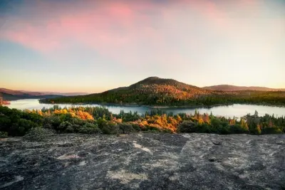 a view of a lake with a mountain in the background at Ely Farm House - Near Yosemite National Park in Oakhurst