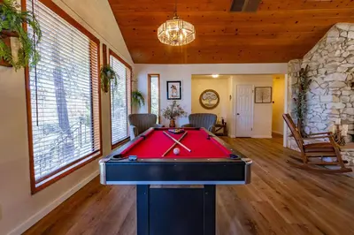 a billiard room with a pool table in a house at Kindred Spirits Lodge near Yosemite & Bass Lake! in Oakhurst
