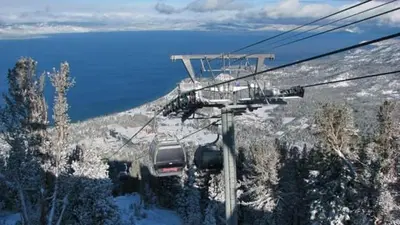 a car on a ski lift in the snow at Heavenly Stagecoach Ski Retreat in Stateline