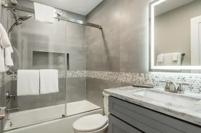 a bathroom with a toilet and a sink and a shower at Snowcreek IV 559 in Mammoth Lakes