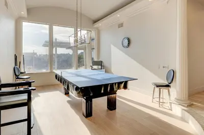 a dining room with a ping pong table at Luxury Pilot Hill Estate on an 800-Acre Vineyard in Pilot Hill