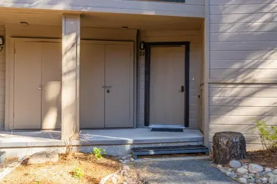 two doors on the side of a house at St Moritz 38 in Mammoth Lakes