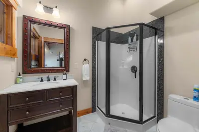 a bathroom with a shower and a sink at Aspen Edge Lakefront and Loft in South Lake Tahoe