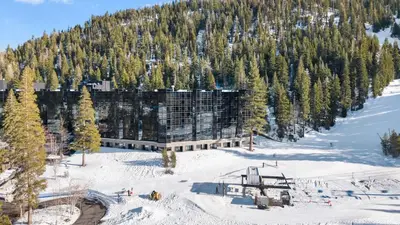 a building on the side of a snow covered mountain at 6th Floor Fireplace Suite in Tahoe City