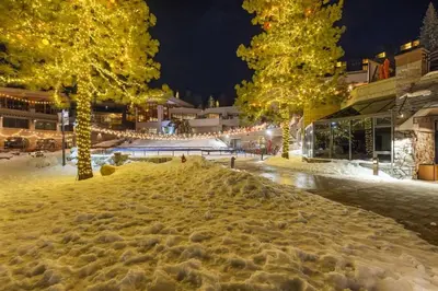 a pile of snow on a city street at night at 6th Floor Fireplace Suite in Tahoe City