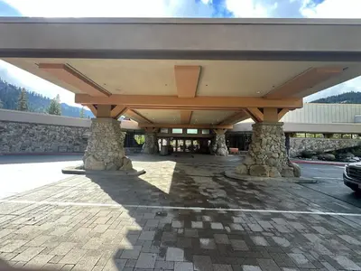 a covered parking lot with a car parked under it at Studio Suite 2 Queen Beds Mountain View in Tahoe City