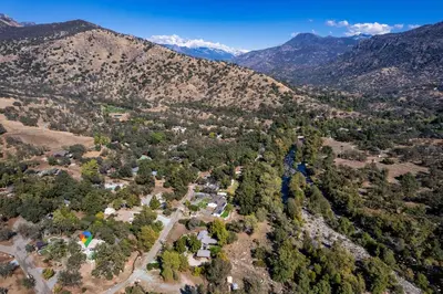 an aerial view of a valley with mountains at Prime Sequoia Stay Pool Hot Tub Sauna Views in Three Rivers