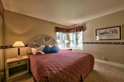a bedroom with a large bed and a window at 1673 Venice Drive home in South Lake Tahoe