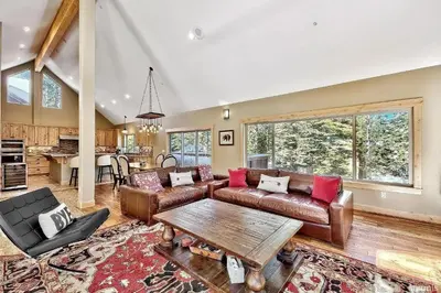 a living room with a couch and a table at 539 Wintoon Drive home in South Lake Tahoe