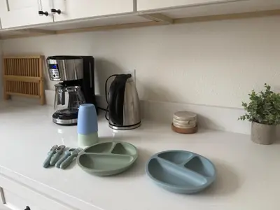 a kitchen counter with two blue bowls on it at New! Modern 4BR max 12 ppl, 5 mins to everything! in Reno