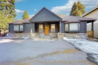 a house with a driveway in front of it at Lakeview Getaway at Rubicon Bay in Tahoma