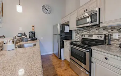 a kitchen with a sink and a stove top oven at Spooner Summit For 6ppl in Zephyr Cove