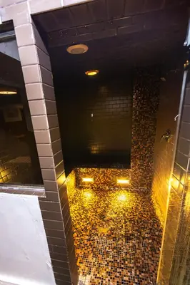 an overhead view of a bathroom with a tile floor at The Sierra House in Mammoth Lakes