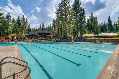 a large swimming pool at a resort at Walk to Gondola Truckee Retreat with Resort Perks! in Truckee