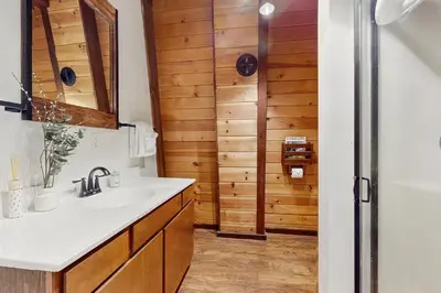 a bathroom with a sink and a shower at Charming Cabin in South Lake Tahoe