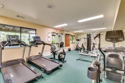 a gym with treadmills and elliptical machines at 3 Mi to Calaveras Big Trees Group-Ready Mtn Cabin in Arnold