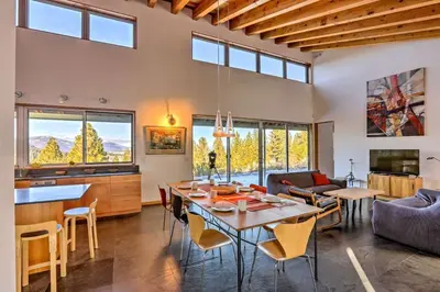 a large living room with a table and chairs at A Quiet Escape in Truckee