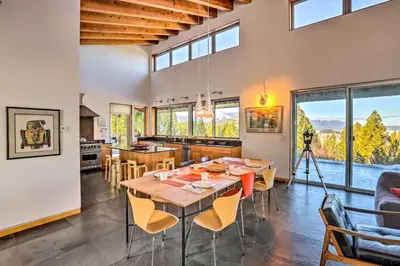 a dining room and kitchen with a table and chairs at A Quiet Escape in Truckee