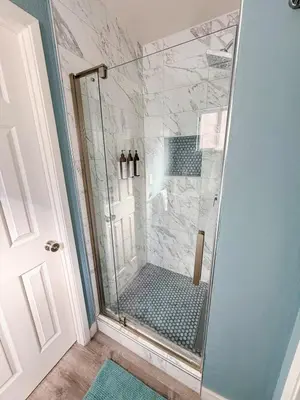 a shower with a glass shower stall in a bathroom at Charming Lake Tahoe Getaway 30 Plus Days Bookings Only Accepted in Zephyr Cove