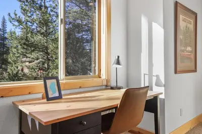 a desk in a room with a window at Evergreen Getaway Pet Friendly in SLT w Hot Tub in South Lake Tahoe