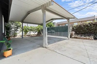 a covered patio with a white roof at Boho Chic Dt Visalia W Modern Art Flair in Visalia
