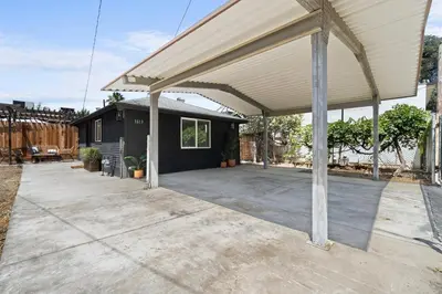 a large patio with awning on a house at Boho Chic Dt Visalia W Modern Art Flair in Visalia