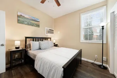 a bedroom with a bed and a window at Luxe Cozy 1 bedroom 1 bathroom near downtown in Sacramento