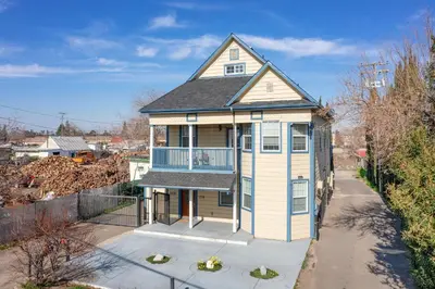 a house with a balcony on a street at Luxe Cozy 1 bedroom 1 bathroom near downtown in Sacramento