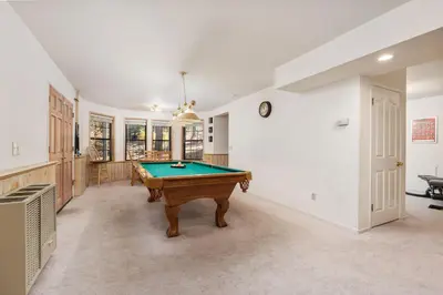 a room with a pool table in it at Silverpine Chalet with Gym Family Friendly in Shaver Lake