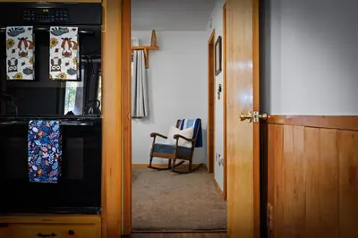 an open door to a kitchen with a stove at Nana & Papas-Family Friendly in East Village in Shaver Lake